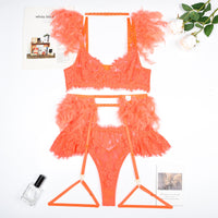 two piece swimsuit with orange feathers on it