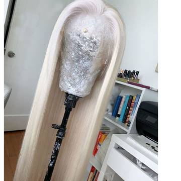 a wig with a long blonde wig on top of it