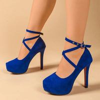Blue ankle strap high heel pumps in suede, perfect for luxurious weddings and formal wear.