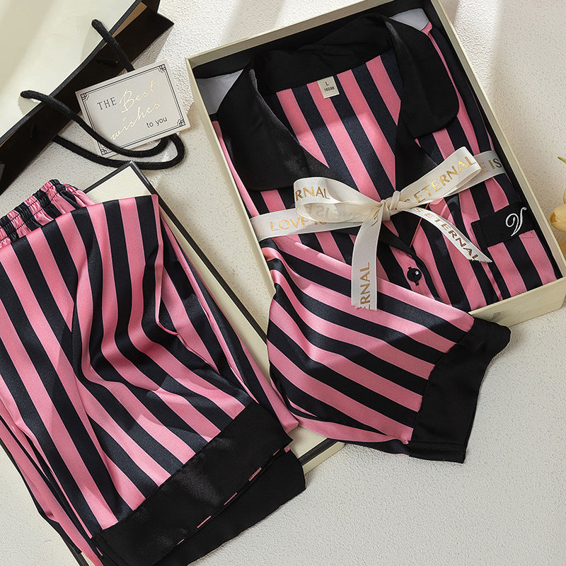 Super Soft Forged Four-sided Elastic Striped Home Wear Suit in pink and black, stylishly packaged for comfort and leisure.