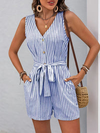 Striped V-neck button front belted romper featuring pockets and a chic silhouette, perfect for summer styling.