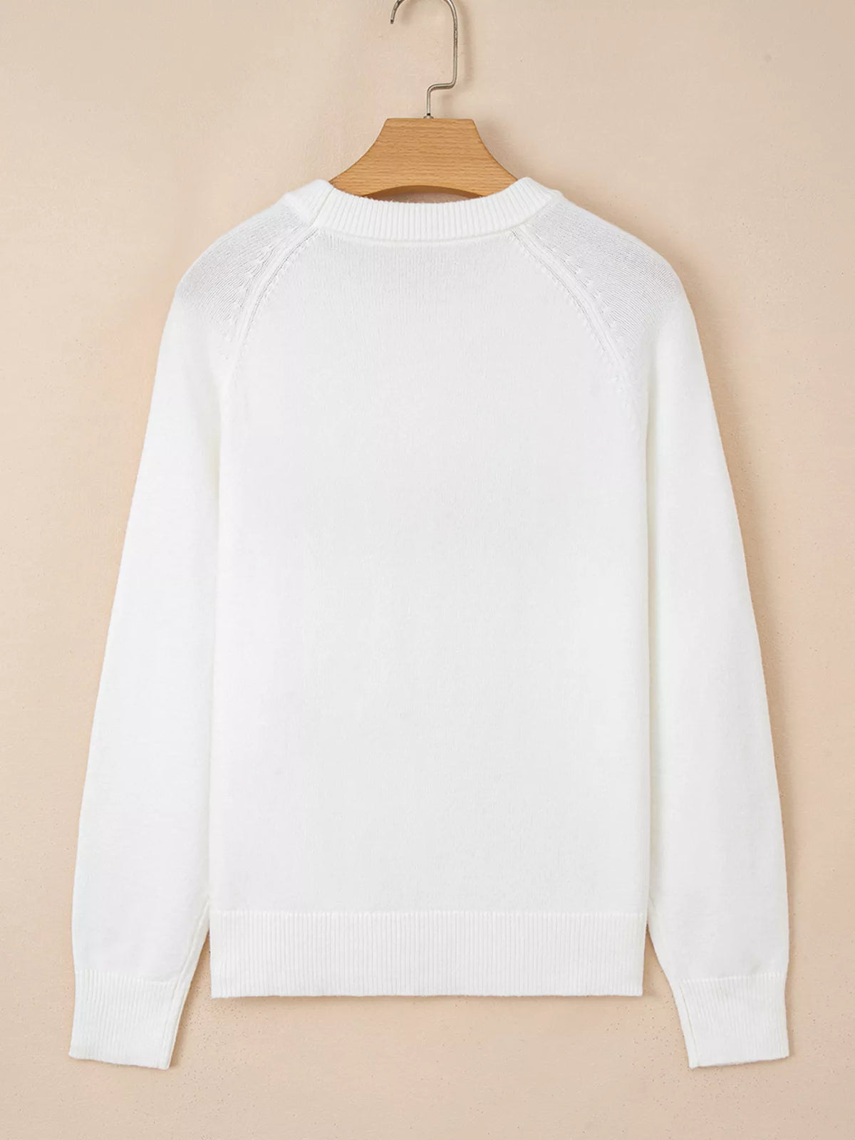 Back view of MERRY Letter Pattern Christmas Raglan Sleeve Sweater showcasing its white design and detailing.