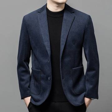 a man in a black shirt and a blue jacket