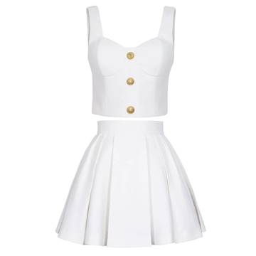 a white dress with a gold button on the front