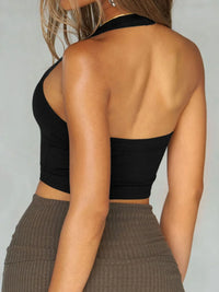Halter neck active cami showcasing the back view, featuring a basic style and moderate stretch.
