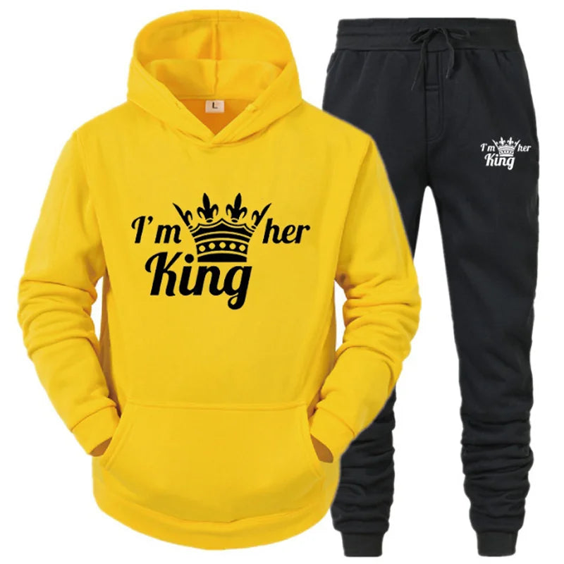 a yellow hoodie and black sweatpants with the words i'm her king
