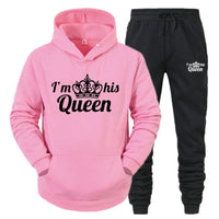 a pink hoodie and black sweatpants with the words i'm his queen