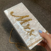 Mrs letter evening bag for women, white marble bridal clutch with gold sequins and chain, perfect for luxurious weddings.