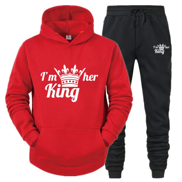 a red hoodie and black sweatpants with the words i'm her king