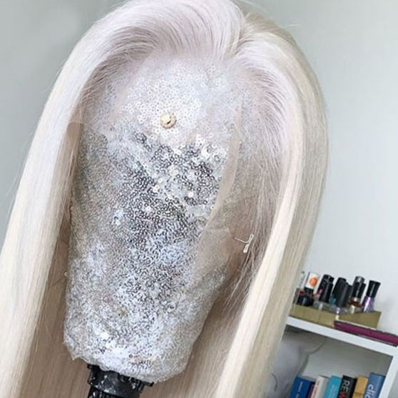 a blonde wig with silver glitter on top of it