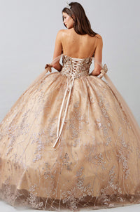 a woman in a ball gown with a bow on her back