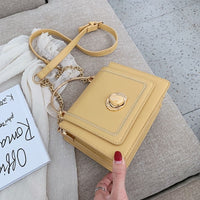 Stylish yellow leather mini crossbody bag for women, perfect for luxurious weddings and everyday elegance.