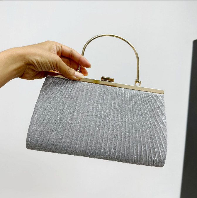 Elegant pleated shiny evening handbag for luxurious weddings, featuring a stylish handle and premium craftsmanship.