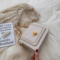 Elegant leather mini crossbody bag for women, perfect for luxurious weddings and versatile style.