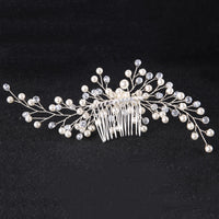a bridal hair comb with pearls and crystals