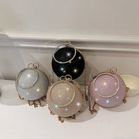 Elegant spherical handbags in black, silver, pink, and gray, perfect for luxurious weddings and stylish occasions.