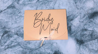 a sign that says bride of the bride on it