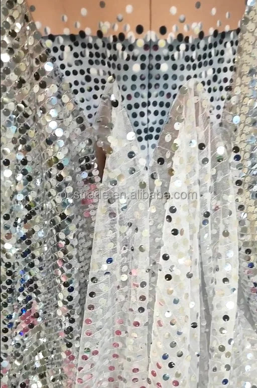 a group of sequins hanging on a wall