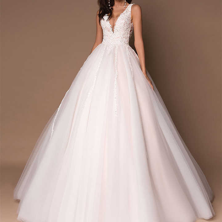 Enchanted Elegance: V-Neck Sleeveless Beaded Ball Gown Wedding Dress Luxurious Weddings