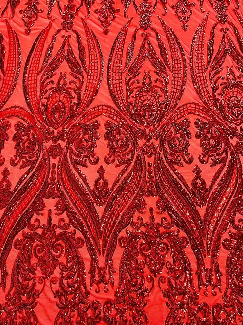a close up of a red lace fabric