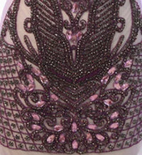 a close up of a dress on a mannequin