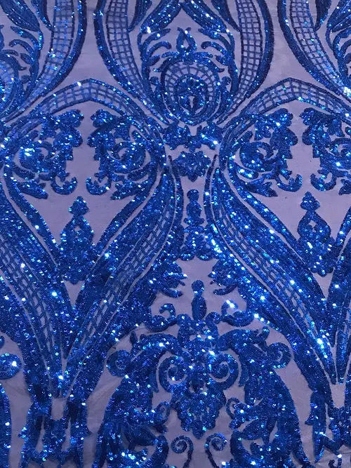 a close up of a blue sequinized fabric