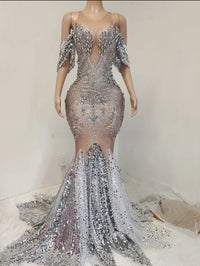 a dress made out of sequins on a mannequin mannequin