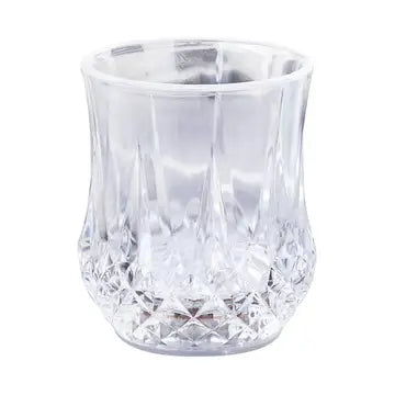 a clear glass vase on a white background