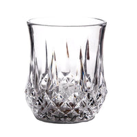 a clear glass vase with a diamond pattern