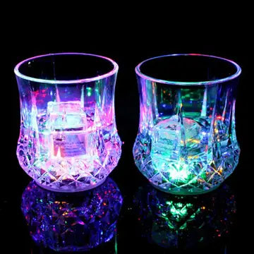 a couple of glasses sitting on top of a table