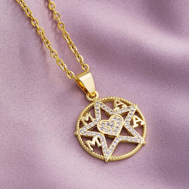 a gold necklace with a star of david on it