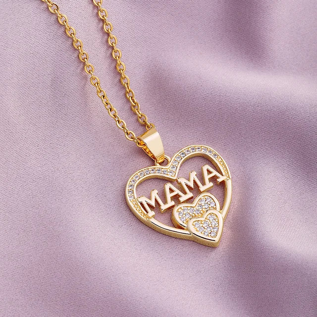 a gold necklace with two hearts and a name on it