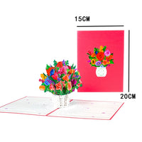 a greeting card with a vase of flowers on it