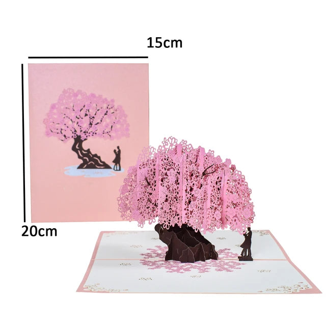 a pop up card with a pink tree on it