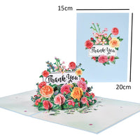 a greeting card with flowers and a thank you sign