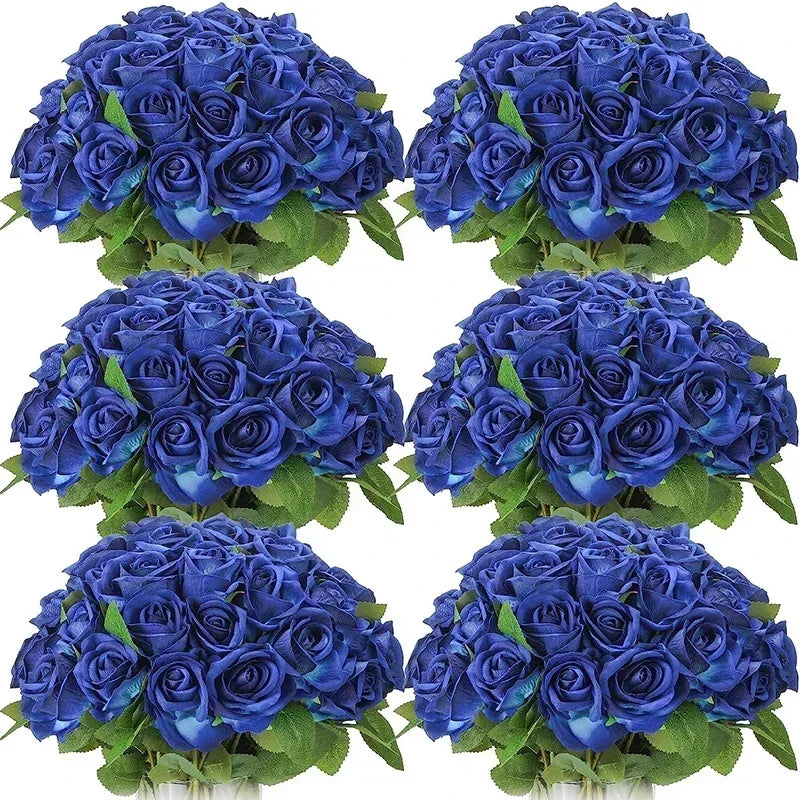a bunch of blue roses in a vase