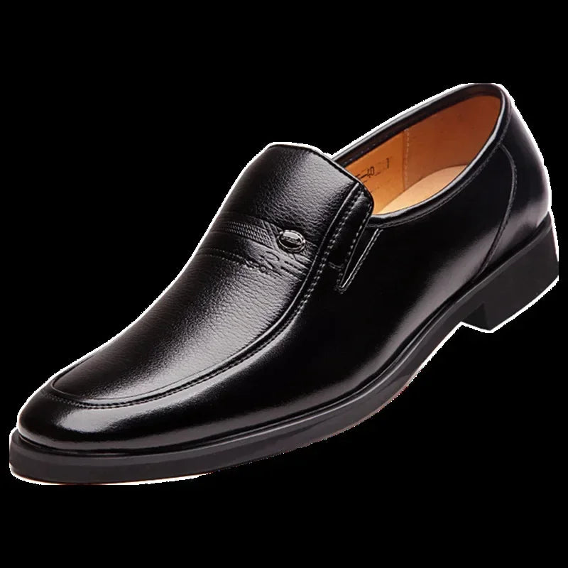 a black loafer with a rubber sole