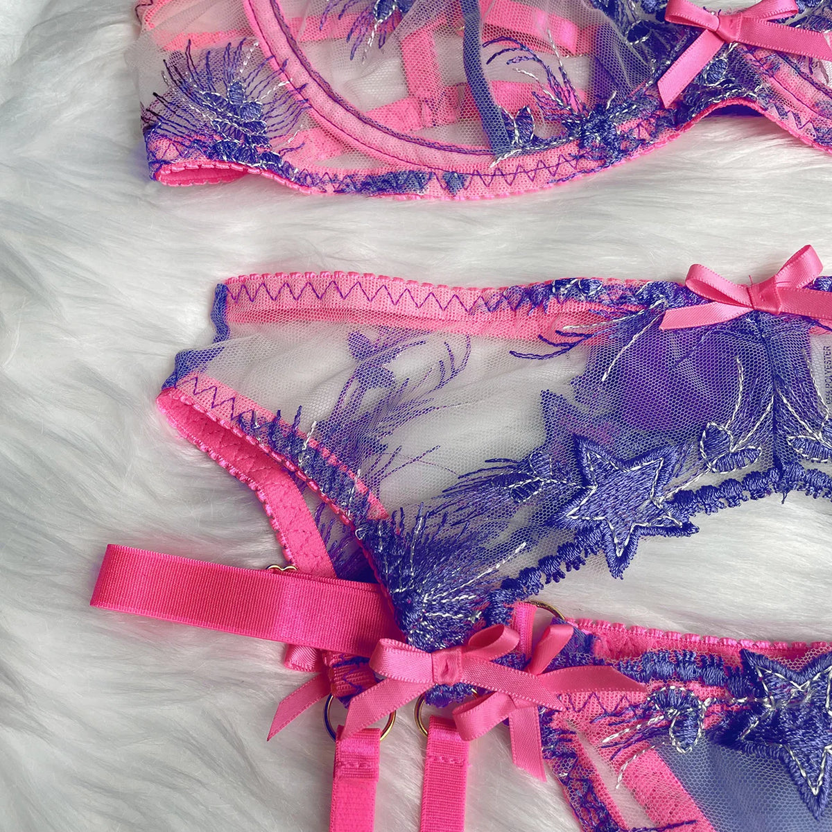 Floral Lace Garter Belt Set in pink and purple, showcasing luxurious fabric and intricate detailing, ideal lingerie in NZ.