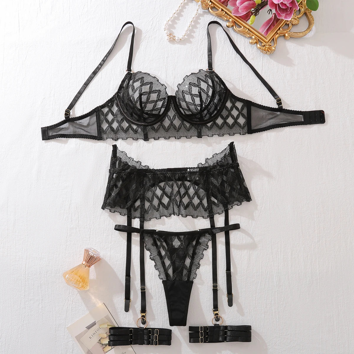 Elegant Lace Suspender Lingerie Set for Women in black, featuring intricate lace design and adjustable straps. Lingerie NZ.