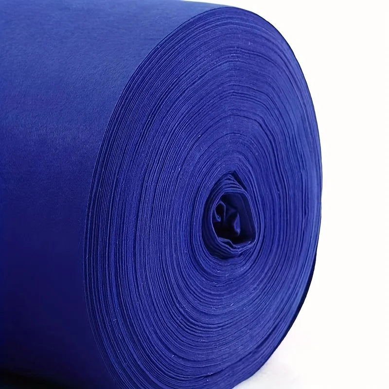 a roll of blue fabric on a white background