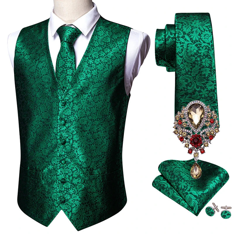 a green vest and tie with a brooch