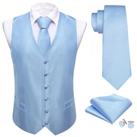 a blue vest, tie, and cufflinks on a mannequin