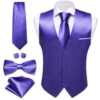 a purple suit, tie, and cufflinks on a mannequin