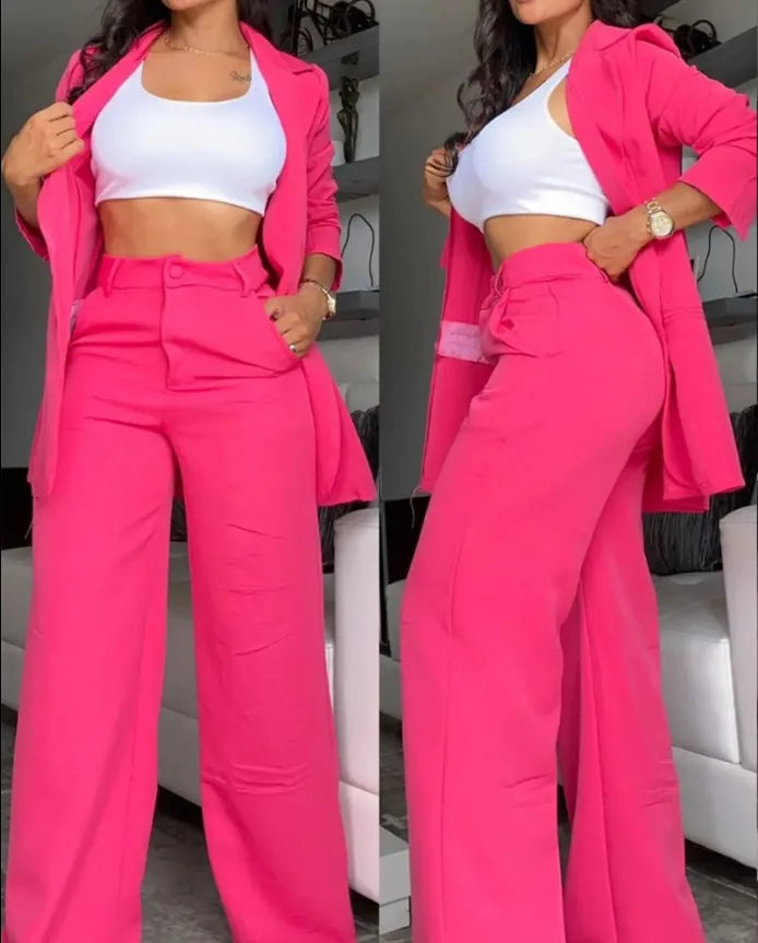 a woman in pink pants and a white top