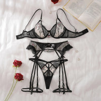 Black floral lace lingerie set for women, featuring see-through embroidery and cut-out accents, ideal for special occasions.