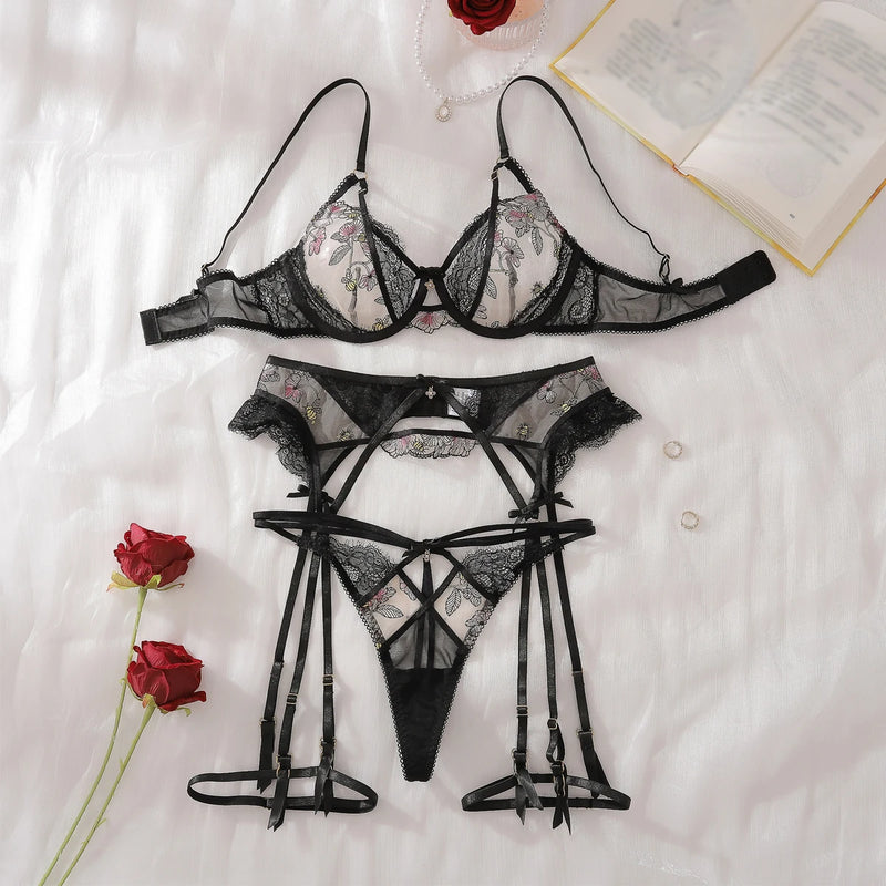 Black floral lace lingerie set for women, featuring see-through embroidery and cut-out accents, ideal for special occasions.