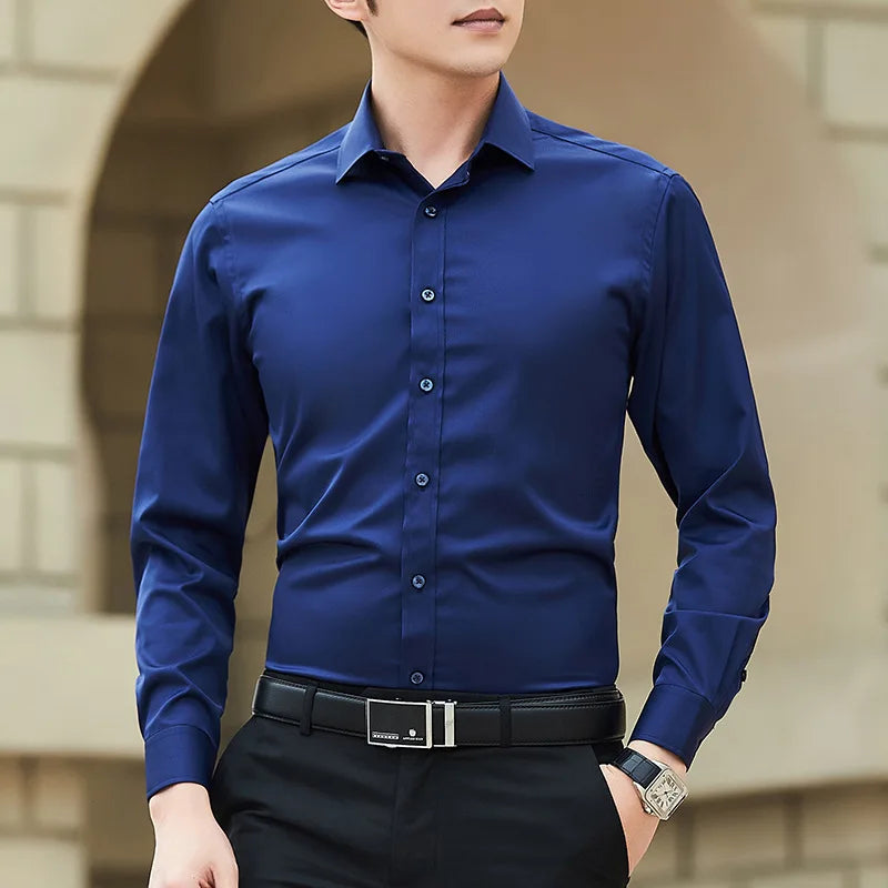 a man wearing a blue shirt and black pants