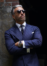 Man in a pin stripe suit