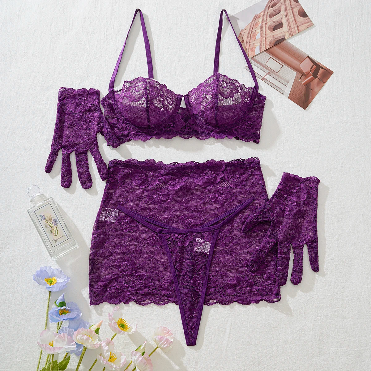 Seductive purple 5-piece lingerie set with lace bra, thong, skirt, and gloves, perfect for romantic occasions in NZ.