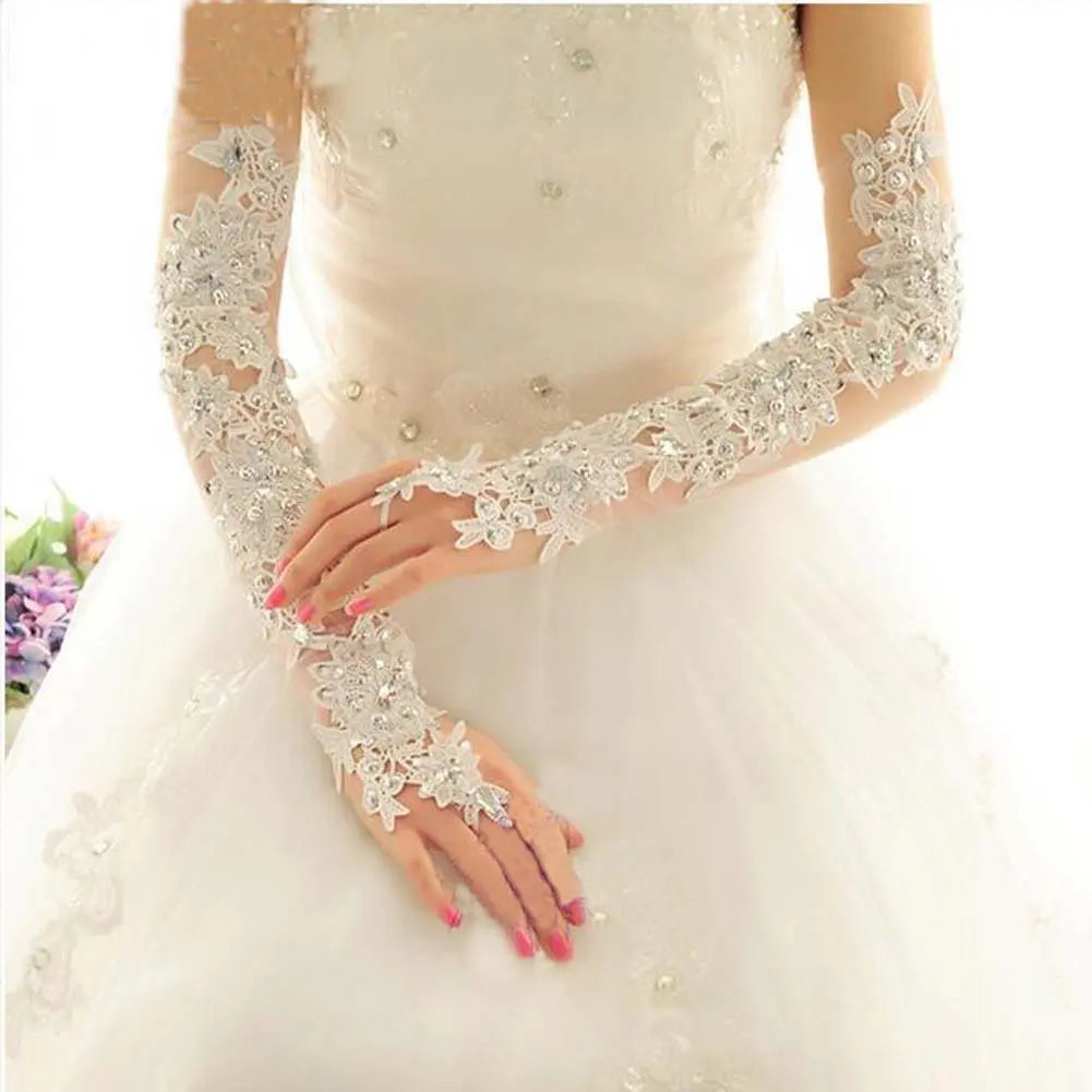 a woman in a wedding dress wearing a white glove